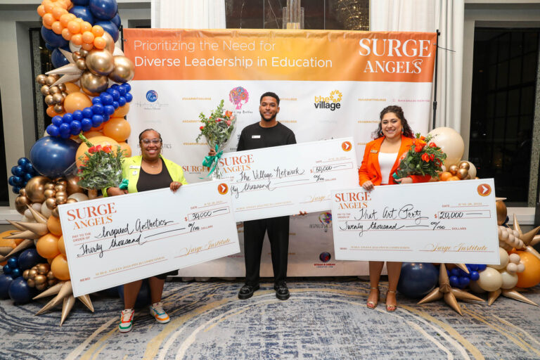 Surge Antels winners hold their checks